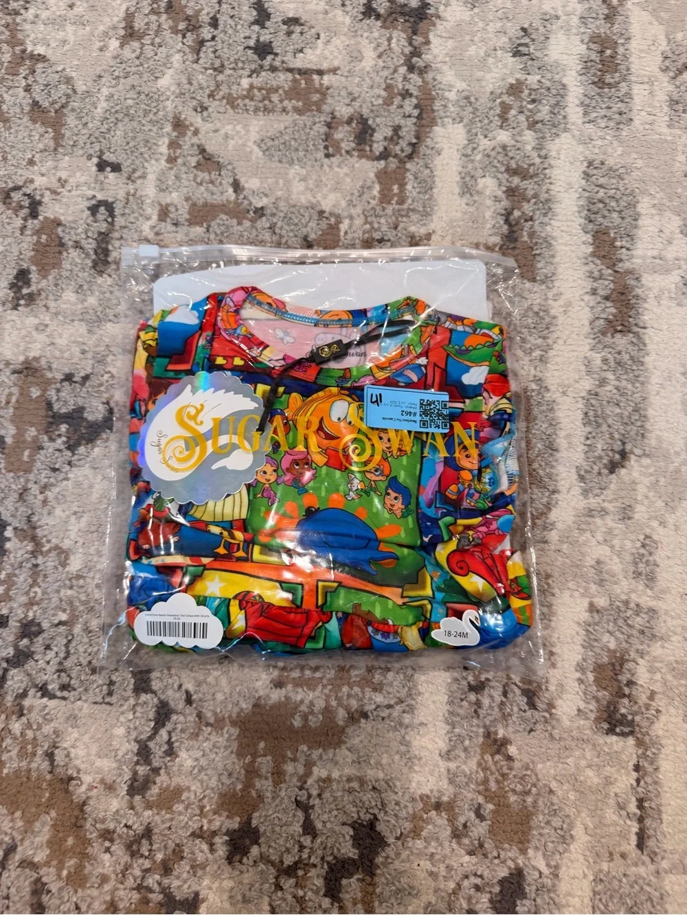 Adventure awaits, peekaboo, twirl onesie with shorts